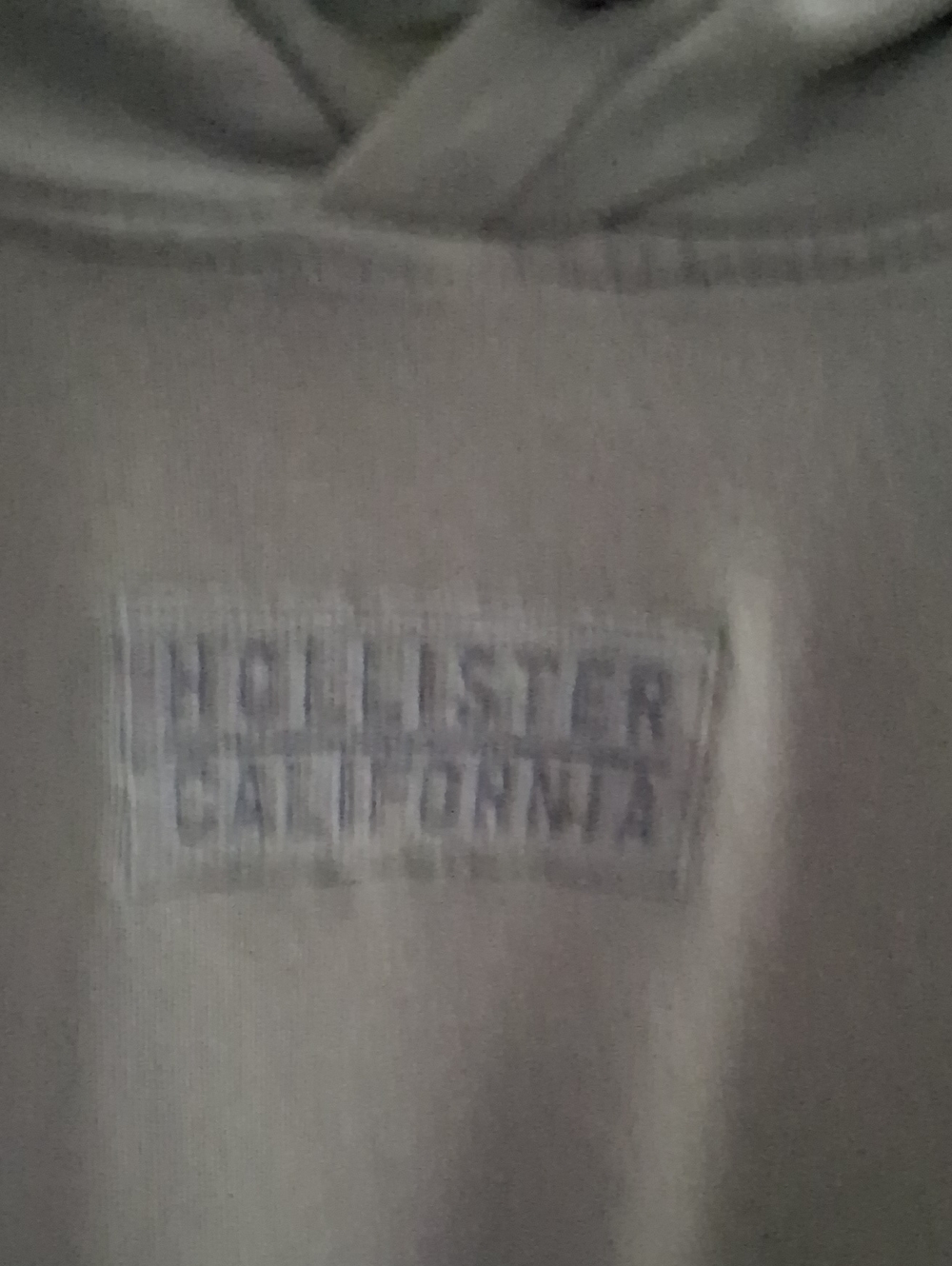 Hollister Men's Light Beige Pullover Hoodie with Chest Logo